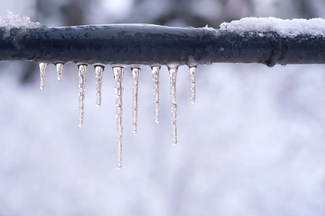 Ice on Gray Pipe