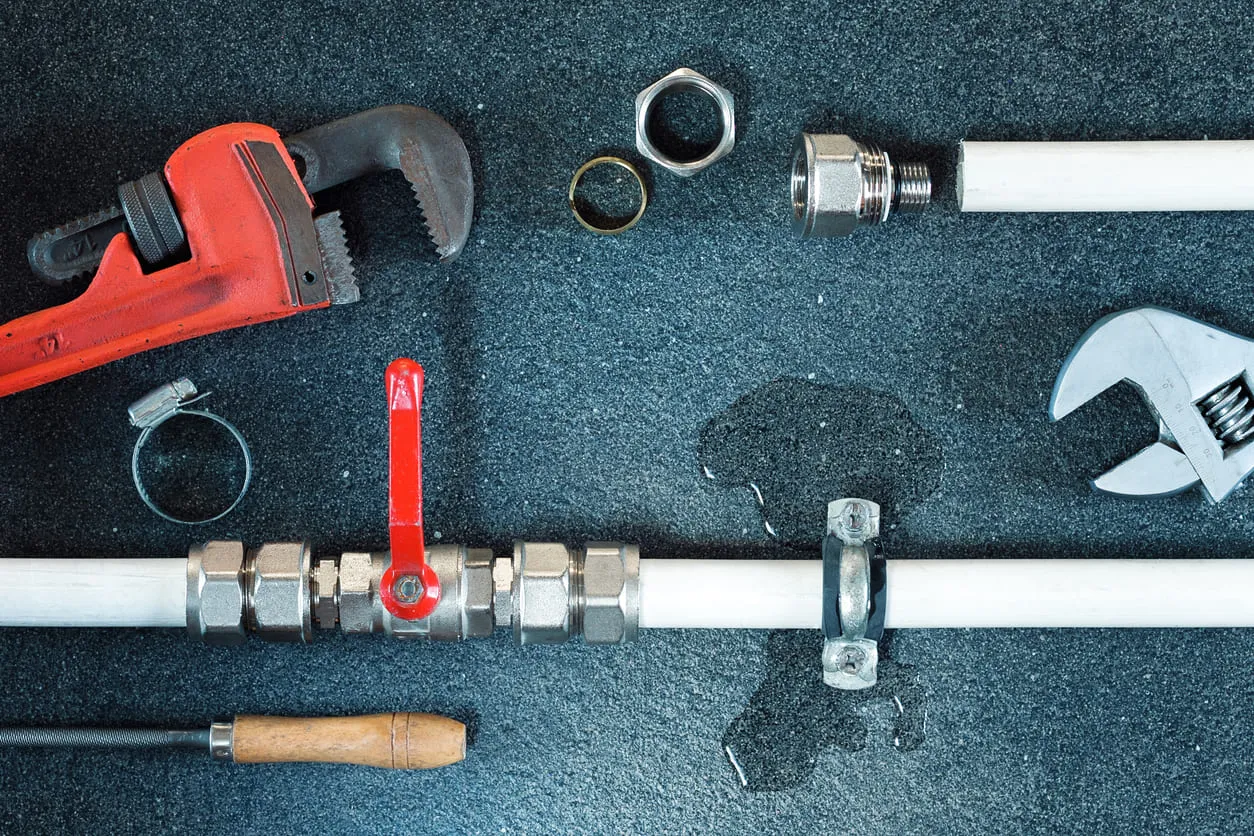 Plumbing Tools and Leaking Pipe
